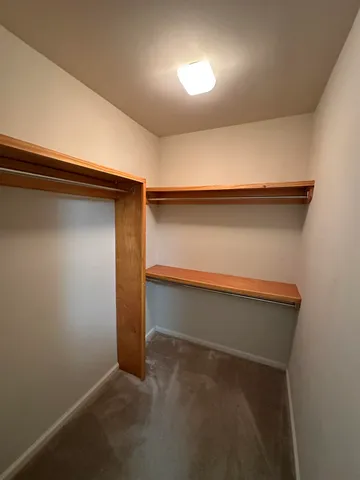 an empty room with a wooden floor