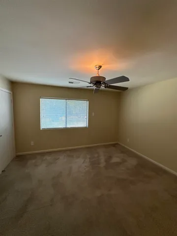 an empty room with a stove