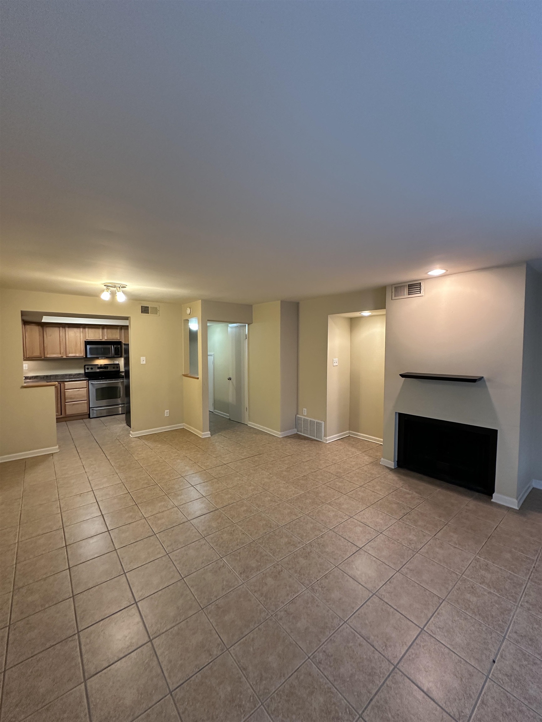 1837 Gray Ridge Cove, Unit 3 Germantown, TN 38138 - Photo 8 of 20 an empty room with furniture and natural light