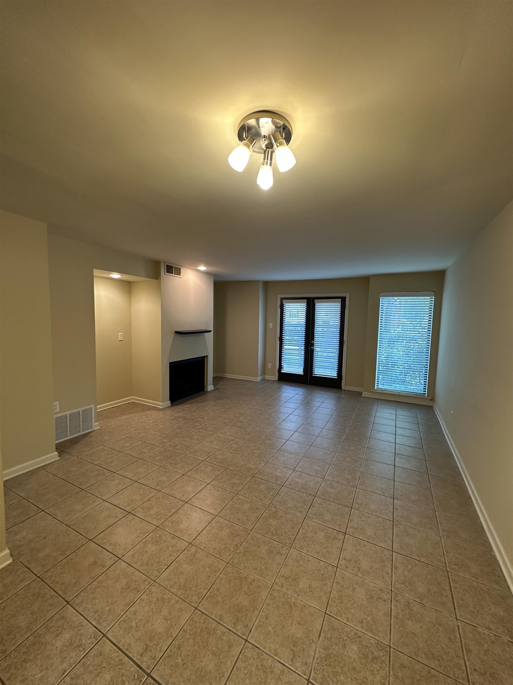1837 Gray Ridge Cove, Unit 3 Germantown, TN 38138 - Photo 9 of 20 a view of an empty room with a window