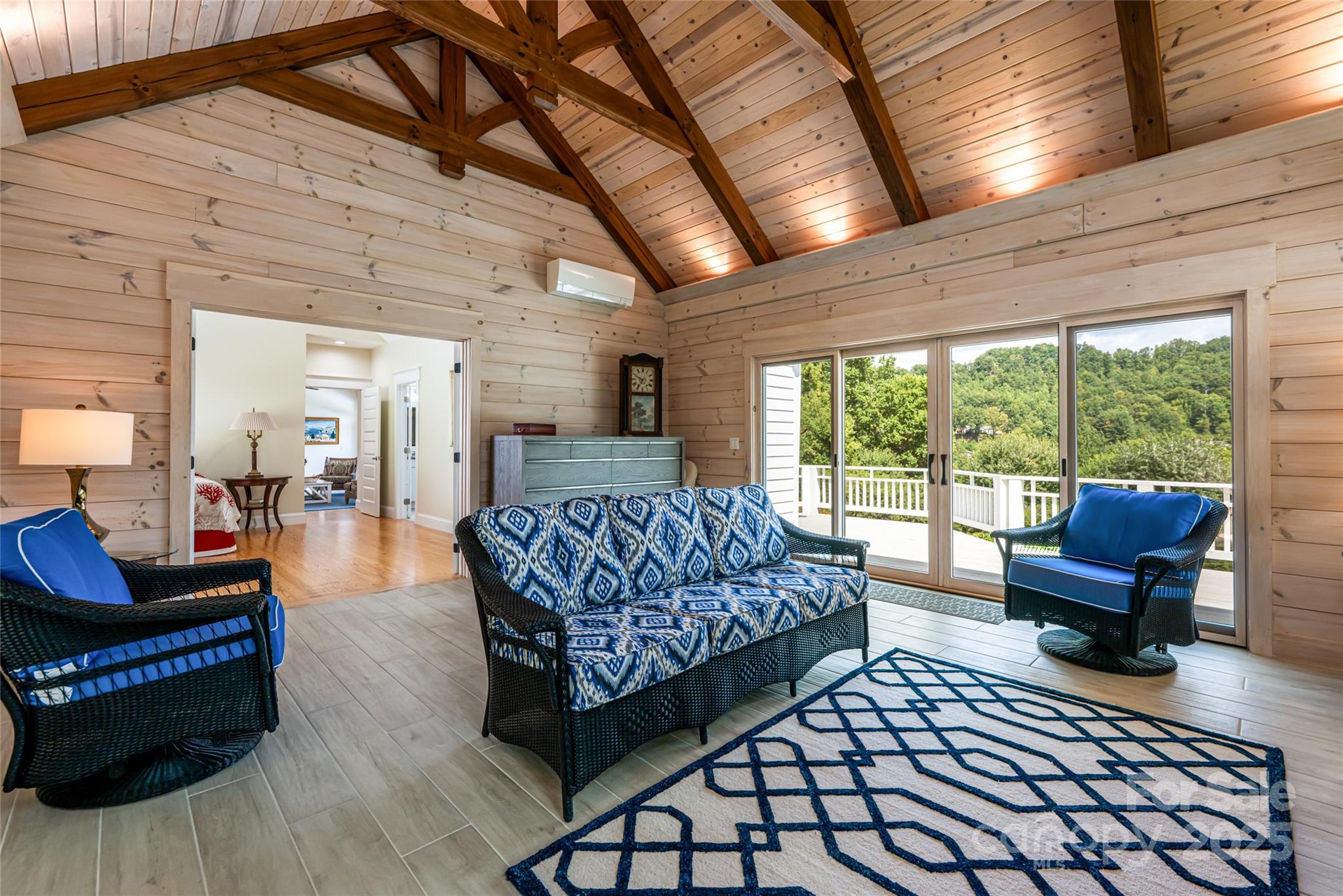208 Parrish Farm Road Waynesville, NC 28786 - Photo 18 of 48 a living room with furniture and a large window