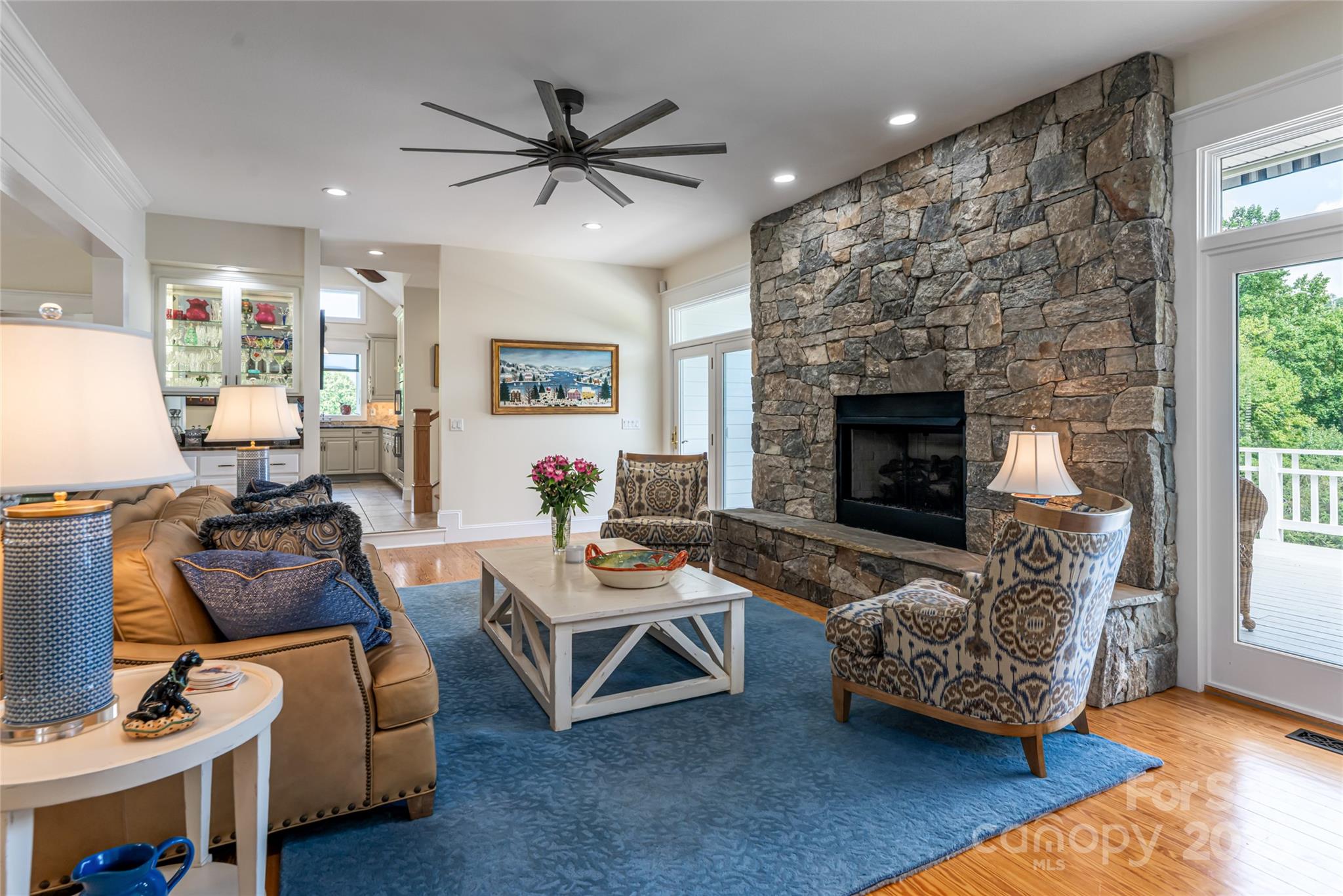 208 Parrish Farm Road Waynesville, NC 28786 - Photo 8 of 48 a living room with furniture and a fireplace