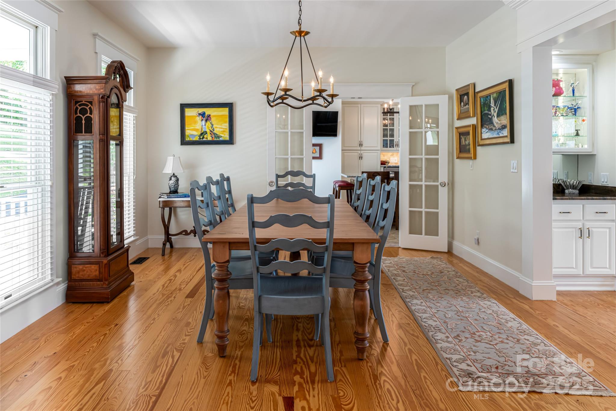 208 Parrish Farm Road Waynesville, NC 28786 - Photo 9 of 48 a view of a dining room with furniture window and wooden floor