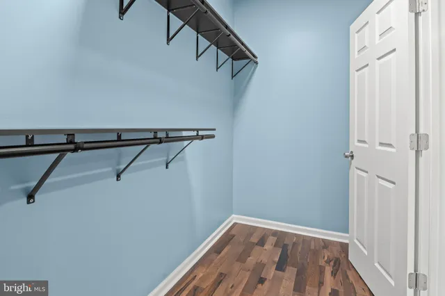 a view of small space with racks on the wall