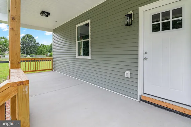 a front view of a house with a garage