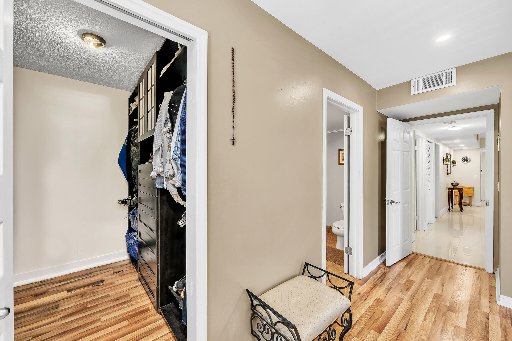 6342 Longboat Lane West, Unit 201 Boca Raton, FL 33433 - Photo 20 of 40 a view of a hallway with wooden floor and entryway