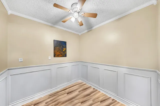 a view of a hallway with a chandelier