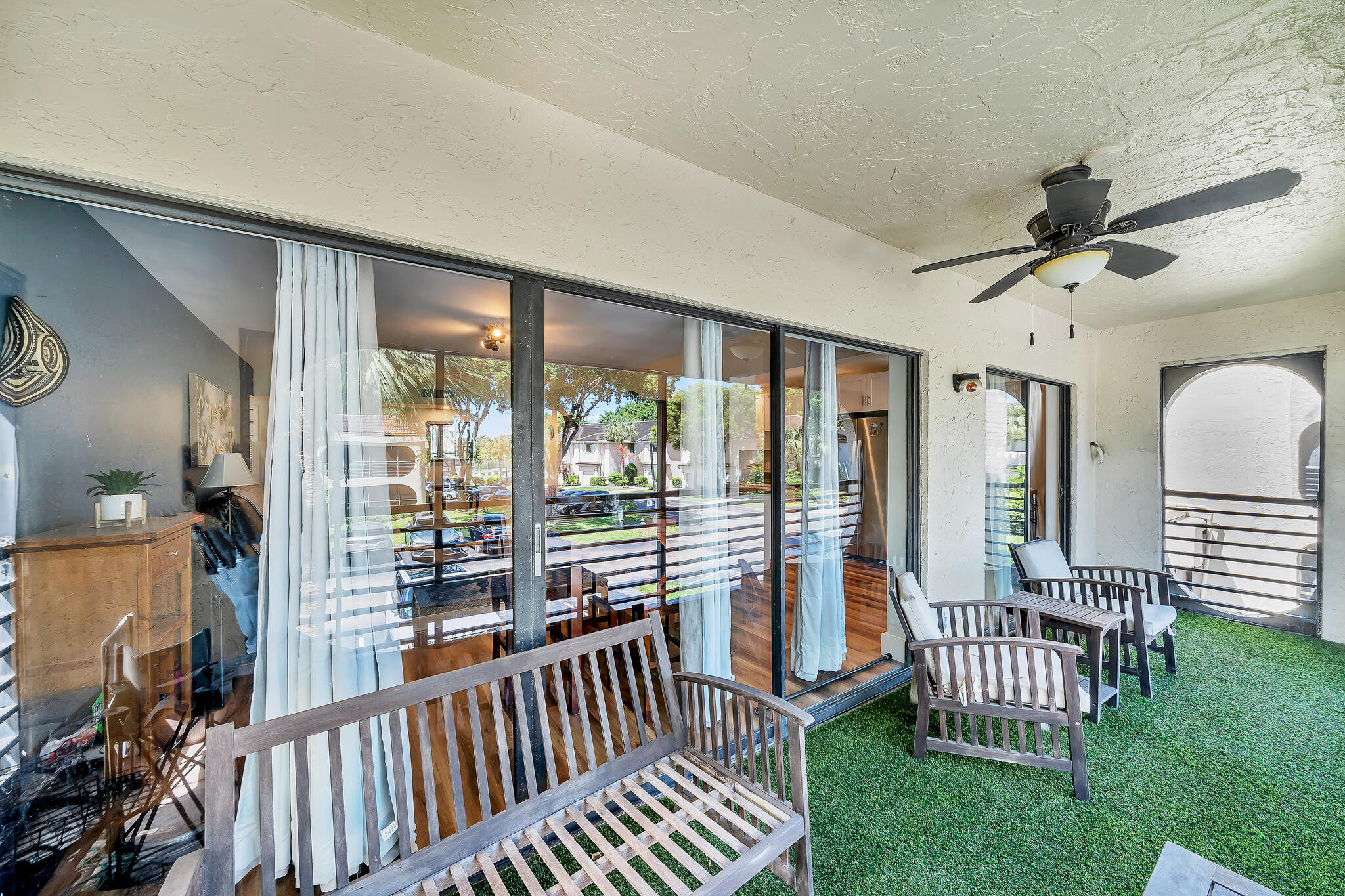 6342 Longboat Lane West, Unit 201 Boca Raton, FL 33433 - Photo 32 of 40 a view of a porch with furniture