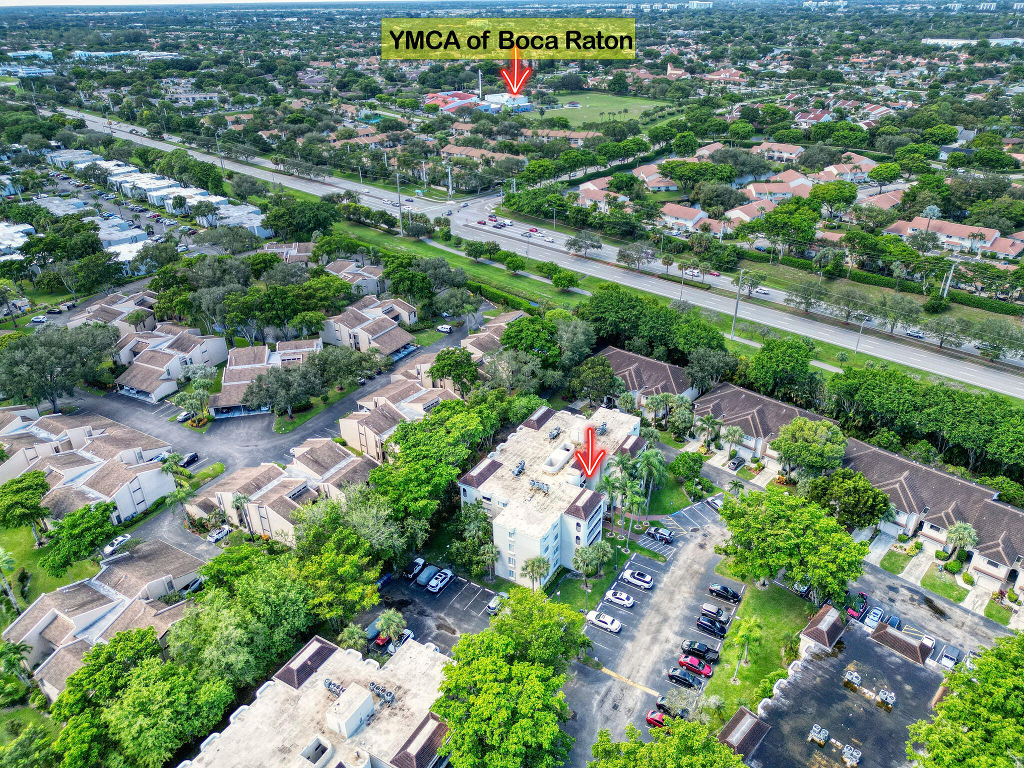 6342 Longboat Lane West, Unit 201 Boca Raton, FL 33433 - Photo 35 of 40 an aerial view of residential houses with outdoor space and trees all around