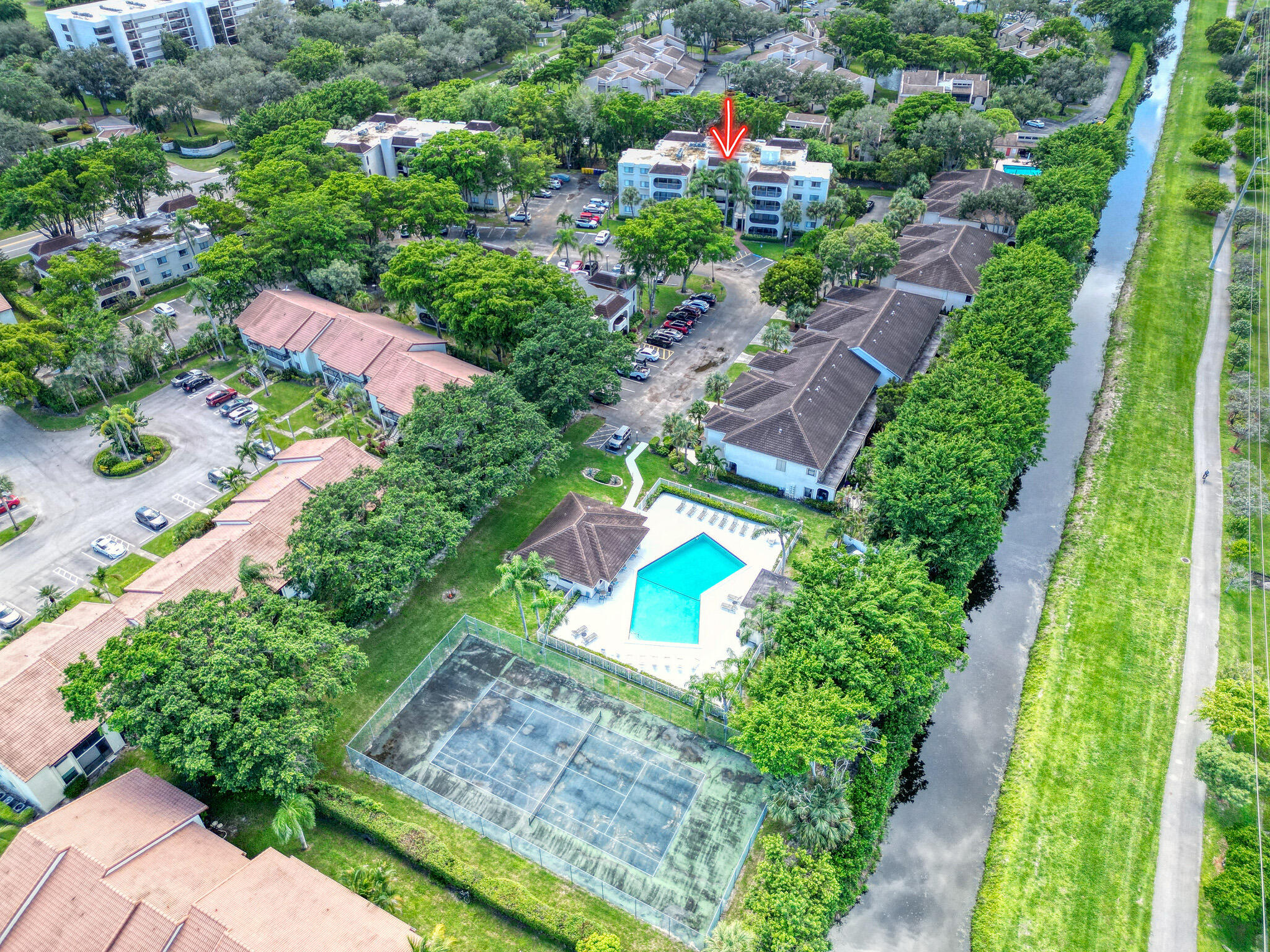 6342 Longboat Lane West, Unit 201 Boca Raton, FL 33433 - Photo 38 of 40 an aerial view of residential houses with outdoor space and trees