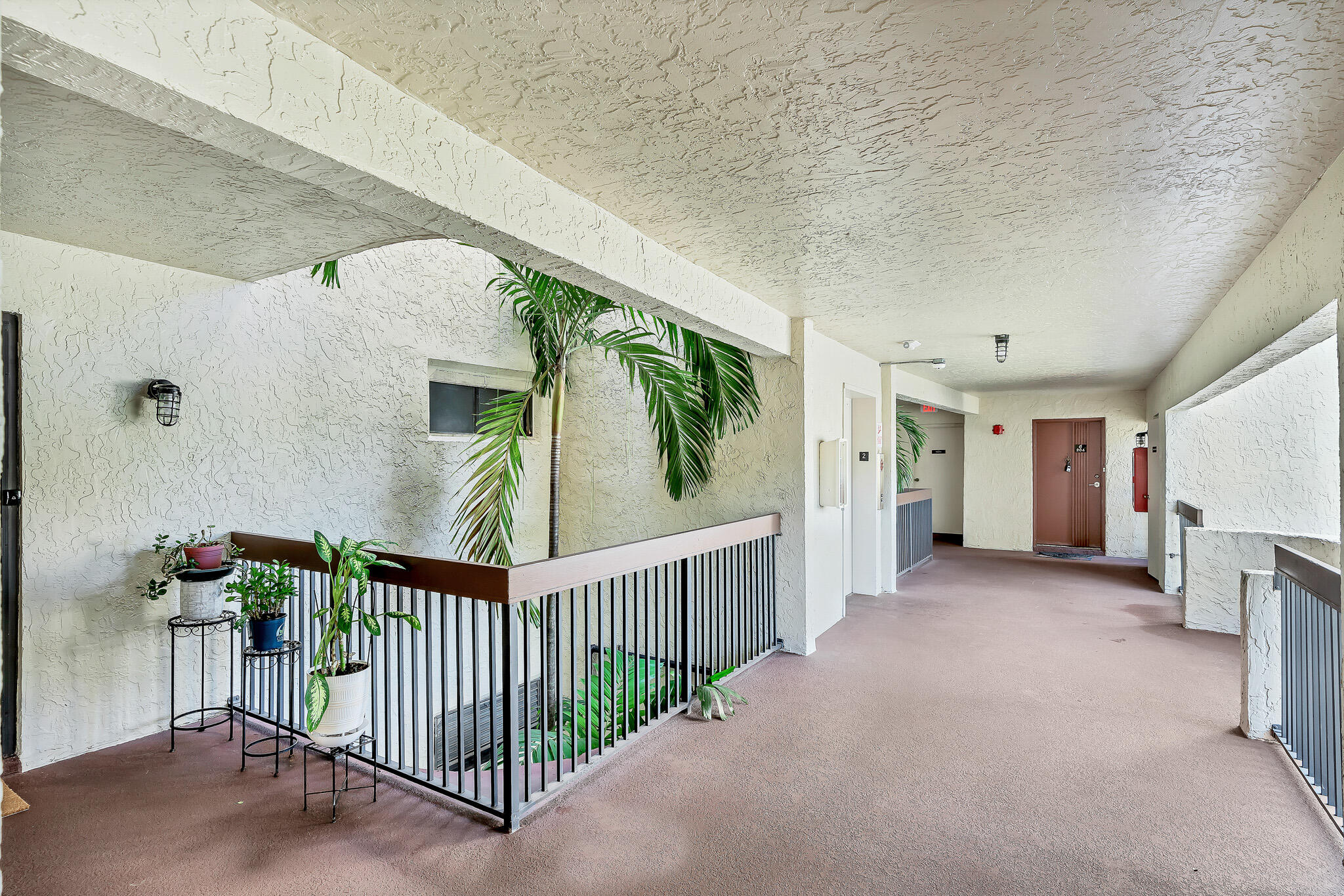 6342 Longboat Lane West, Unit 201 Boca Raton, FL 33433 - Photo 39 of 40 a view of a porch