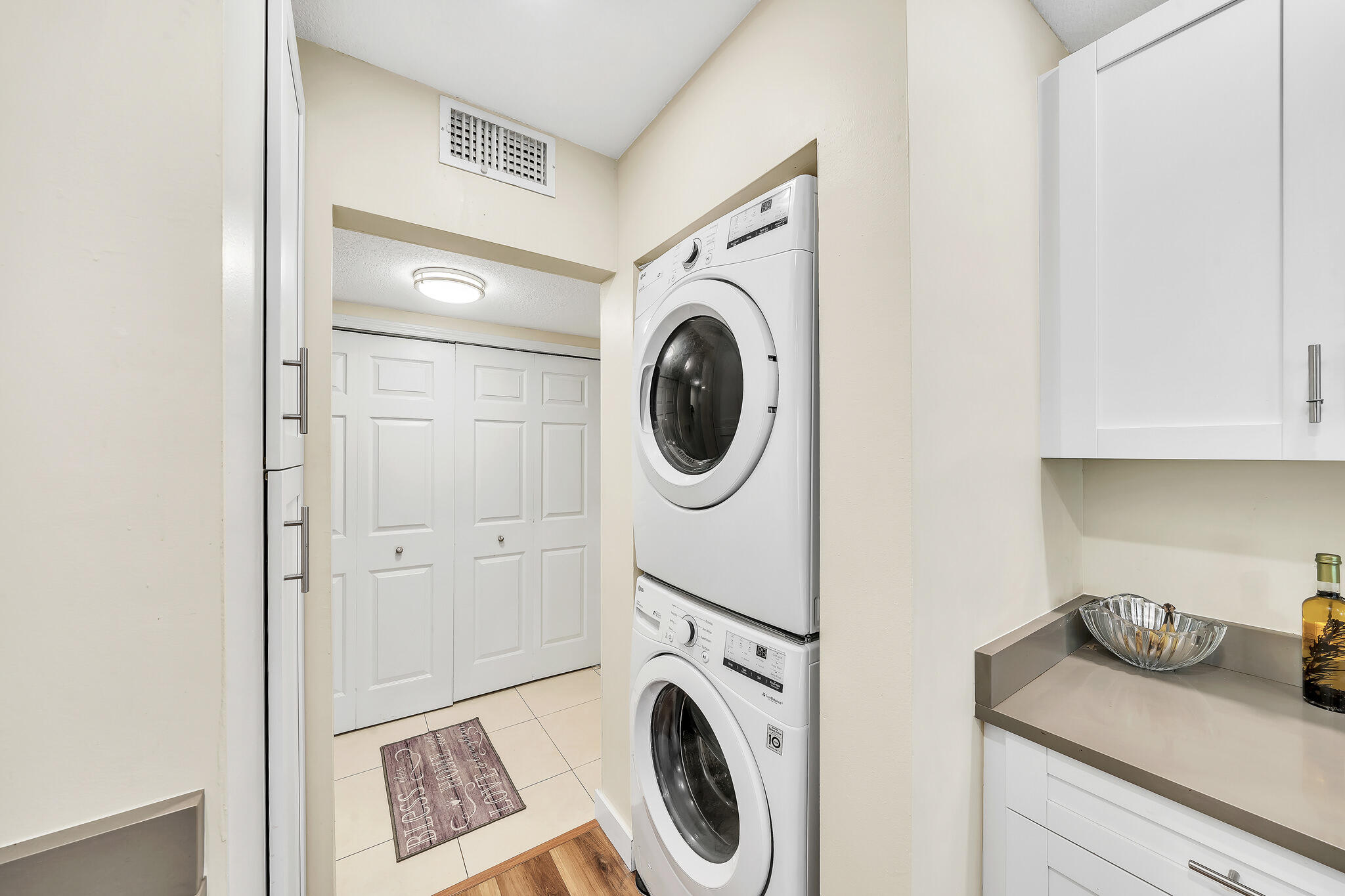 6342 Longboat Lane West, Unit 201 Boca Raton, FL 33433 - Photo 8 of 40 a utility room with dryer and washer