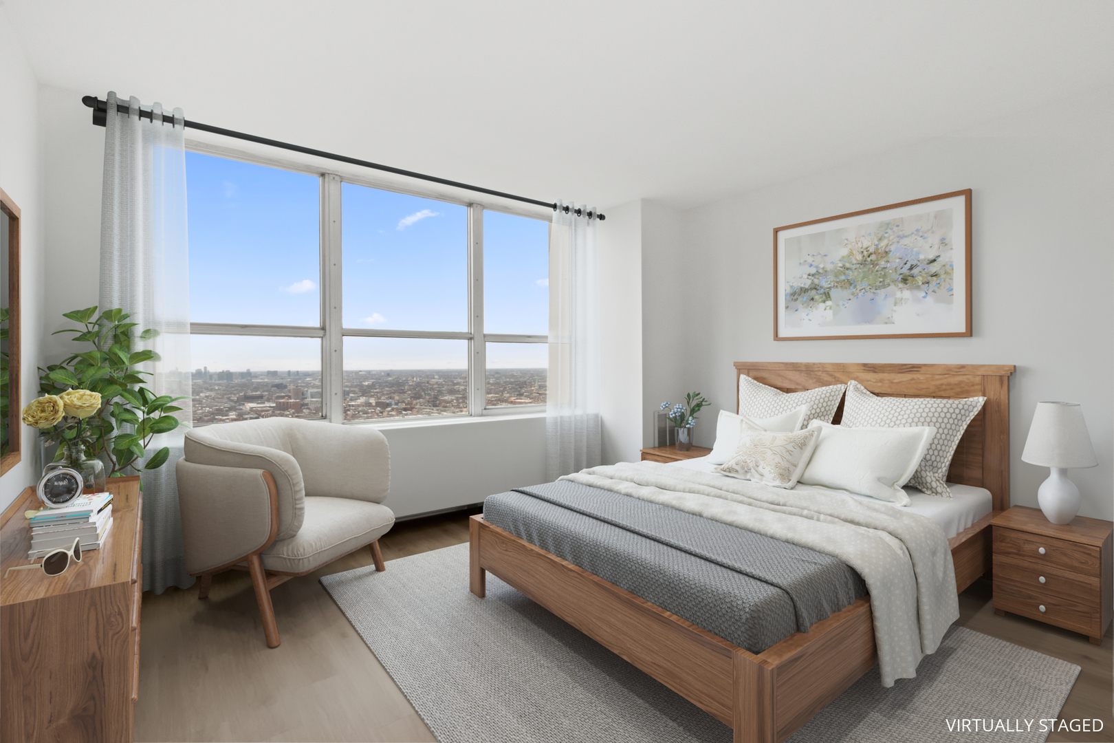 655 West Irving Park Road, Unit 4417 Chicago, IL 60613 - Photo 12 of 24 a bedroom with a bed and a large window