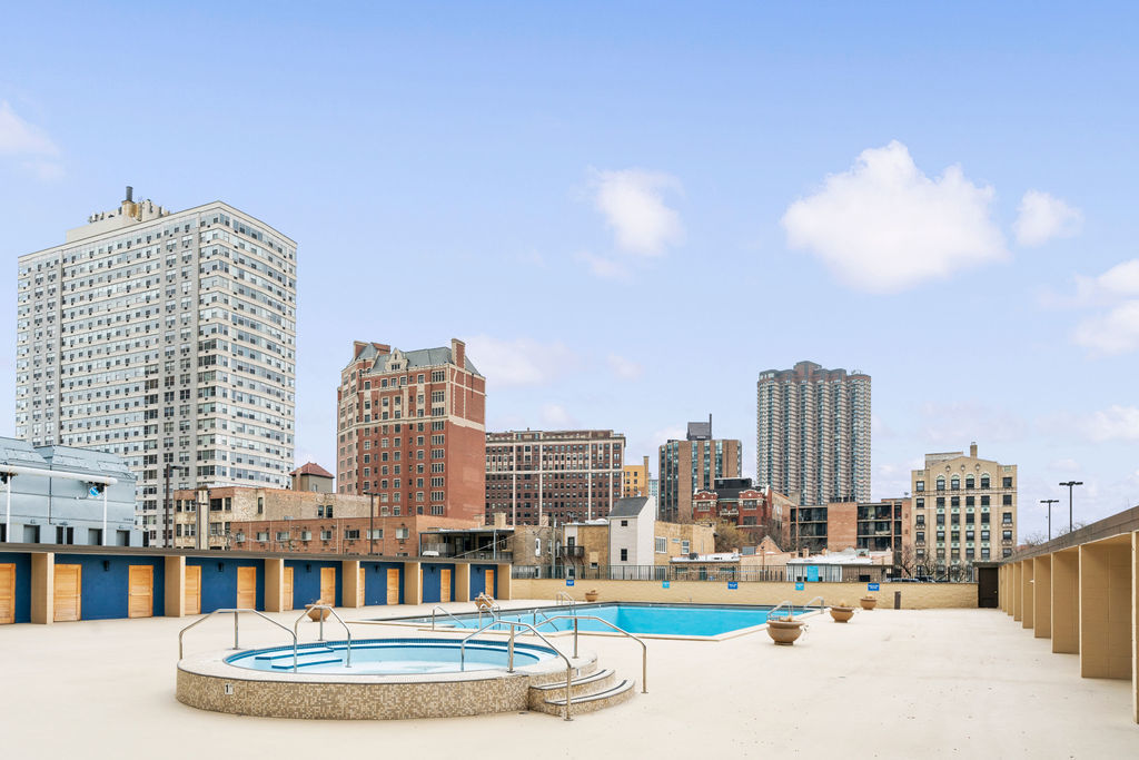 655 West Irving Park Road, Unit 4417 Chicago, IL 60613 - Photo 16 of 24 a multi story building with view of city view