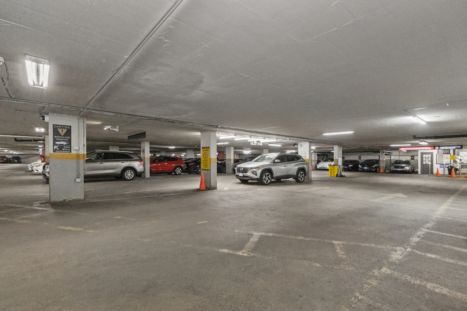 655 West Irving Park Road, Unit 4417 Chicago, IL 60613 - Photo 19 of 24 a view of parking space with parked cars