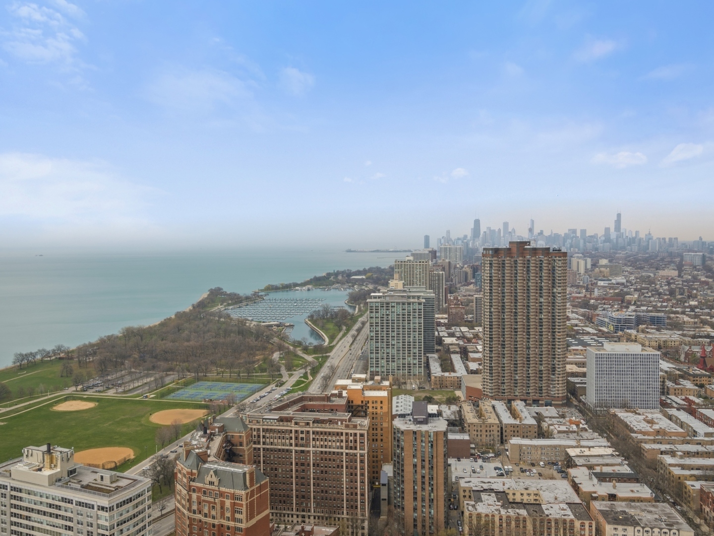 655 West Irving Park Road, Unit 4417 Chicago, IL 60613 - Photo 2 of 24 a view of a city with ocean