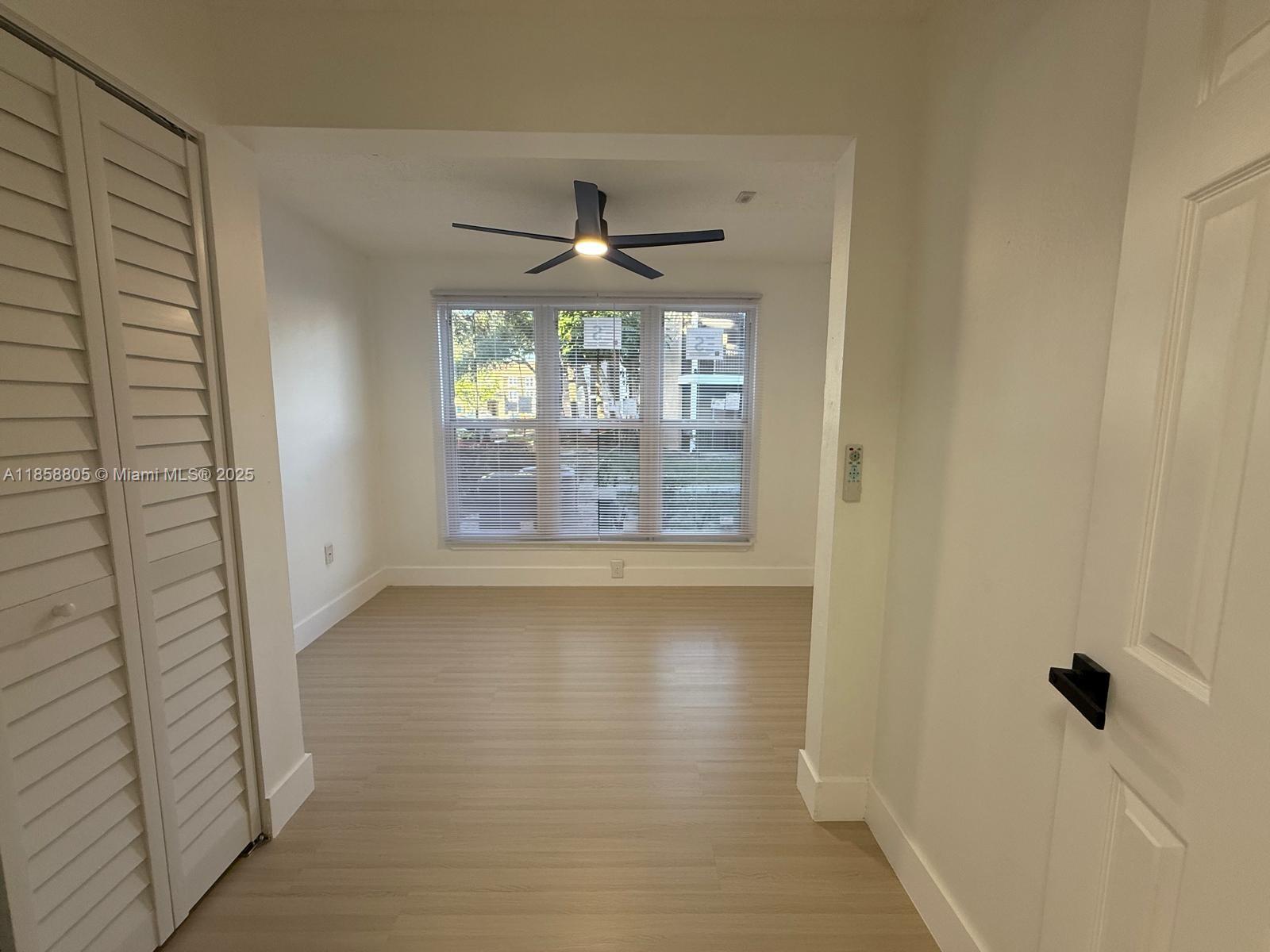 2319 North Congress Avenue, Unit 15 Boynton Beach, FL 33426 - Photo 13 of 20 a view of an empty room with a window