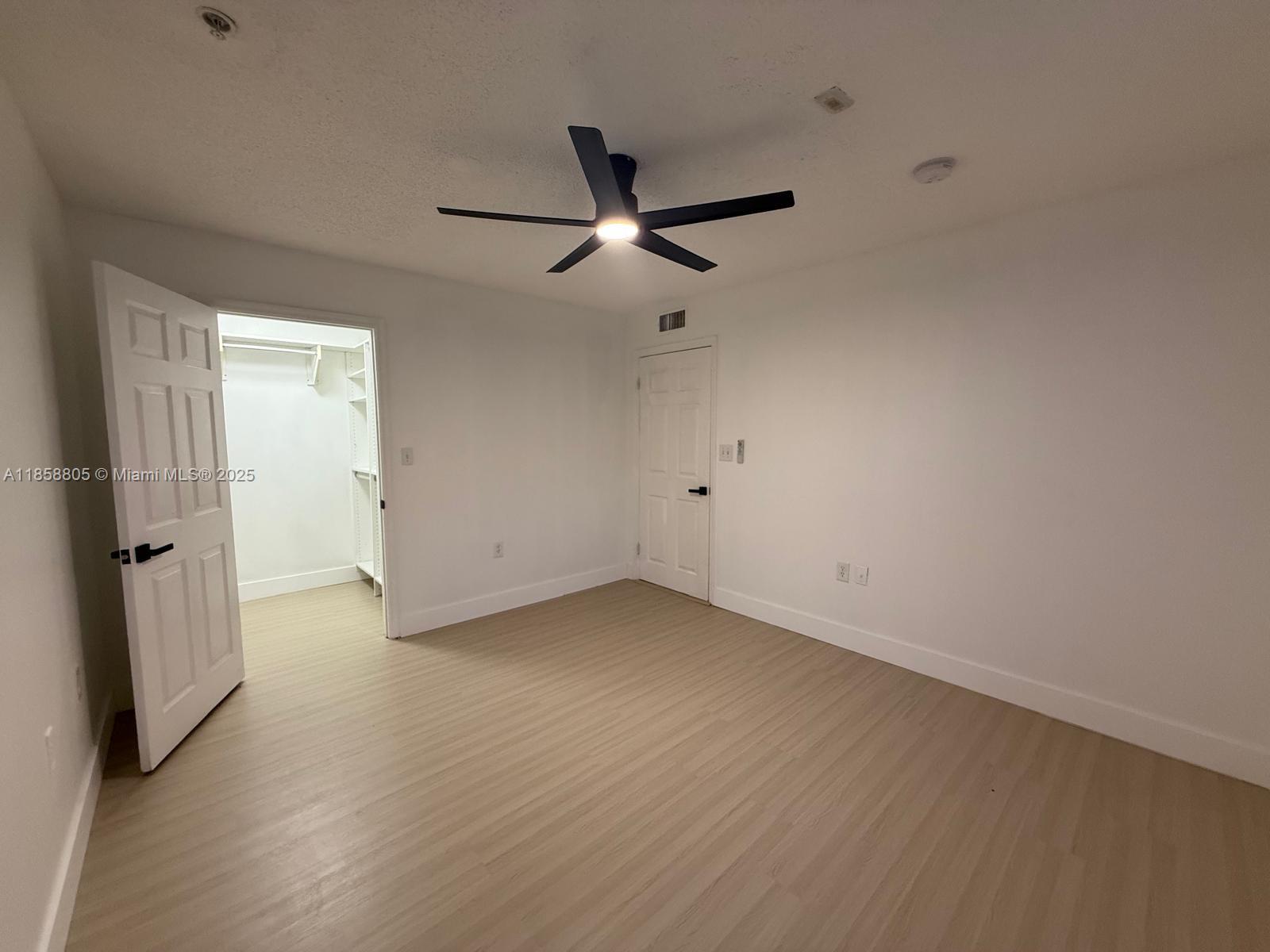 2319 North Congress Avenue, Unit 15 Boynton Beach, FL 33426 - Photo 17 of 20 wooden floor in an empty room