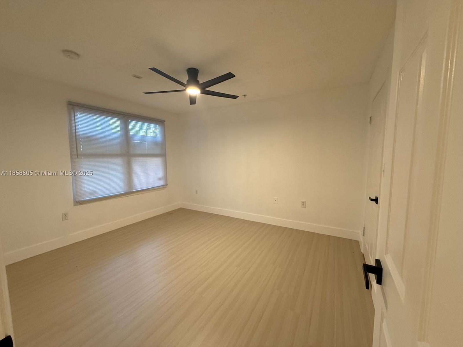 2319 North Congress Avenue, Unit 15 Boynton Beach, FL 33426 - Photo 18 of 20 wooden floor in an empty room