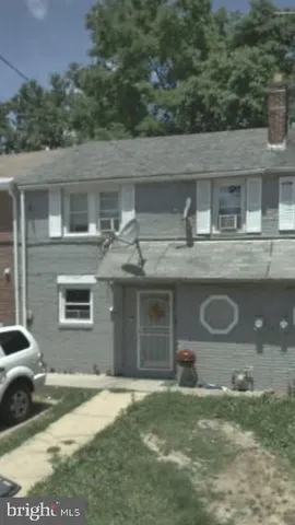 a front view of house with yard