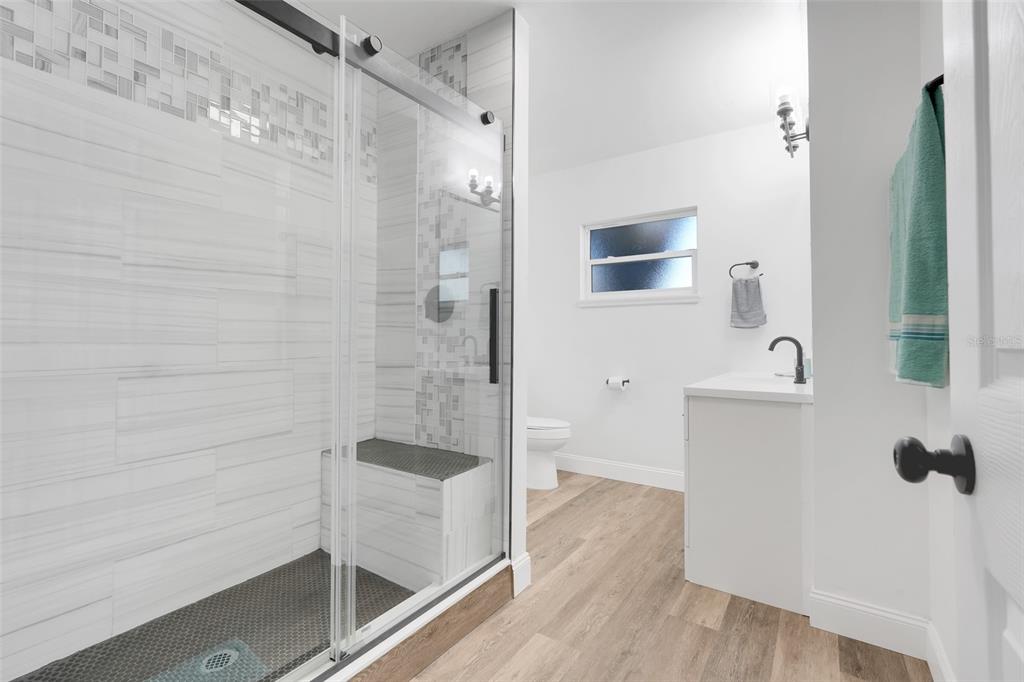 828 St Anne Shrine Road Lake Wales, FL 33898 - Photo 15 of 39 a bathroom with a shower and a sink