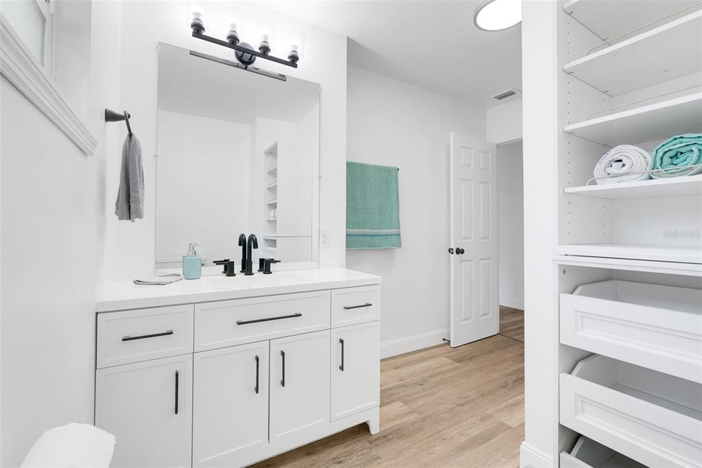 828 St Anne Shrine Road Lake Wales, FL 33898 - Photo 17 of 39 a bathroom with a sink and a mirror