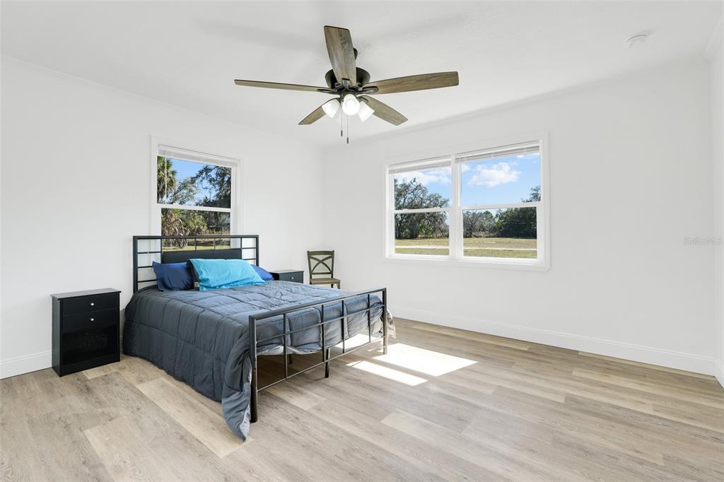 828 St Anne Shrine Road Lake Wales, FL 33898 - Photo 17 of 39 a bedroom with a bed and window