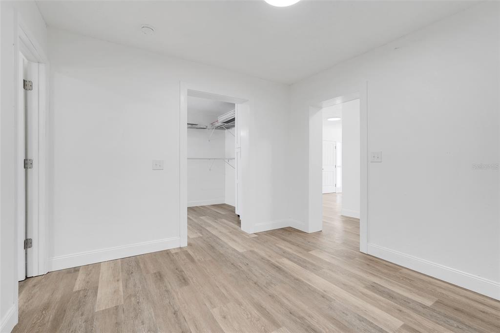 828 St Anne Shrine Road Lake Wales, FL 33898 - Photo 25 of 39 a view of empty room with wooden floor