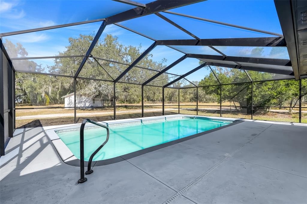 828 St Anne Shrine Road Lake Wales, FL 33898 - Photo 32 of 39 a view of yard with a swimming pool