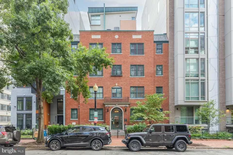 a car parked in front of a building