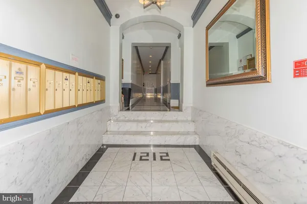 a view of entryway with a front door