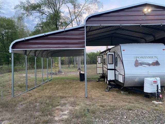 a view of backyard with barbeque grill and a grill