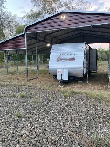 a view of a house with a back yard
