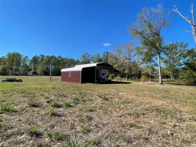 a house view with a garden space