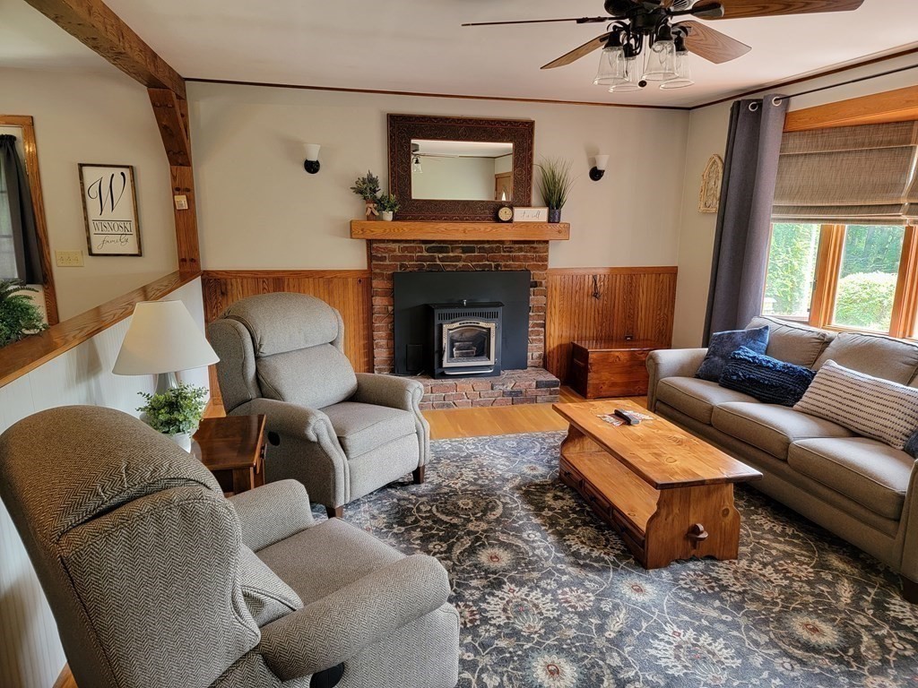 282 Old Gilbertville Road Ware, MA 01082 - Photo 12 of 31 a living room with furniture and a fireplace
