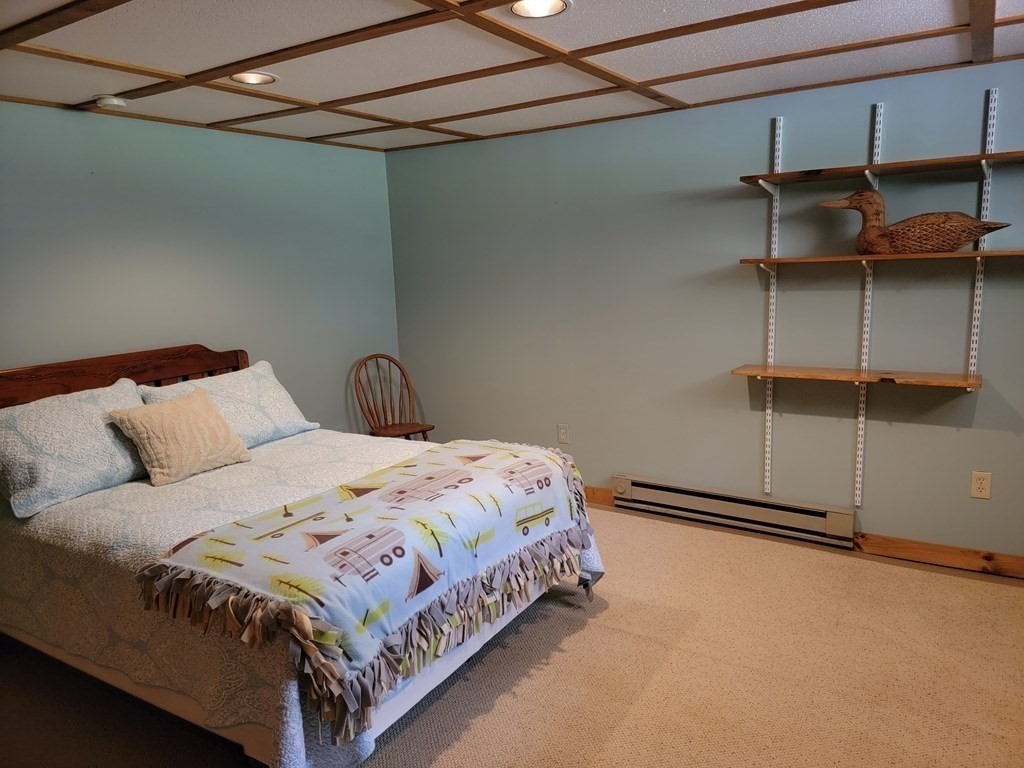 282 Old Gilbertville Road Ware, MA 01082 - Photo 22 of 31 a bedroom with a bed and window