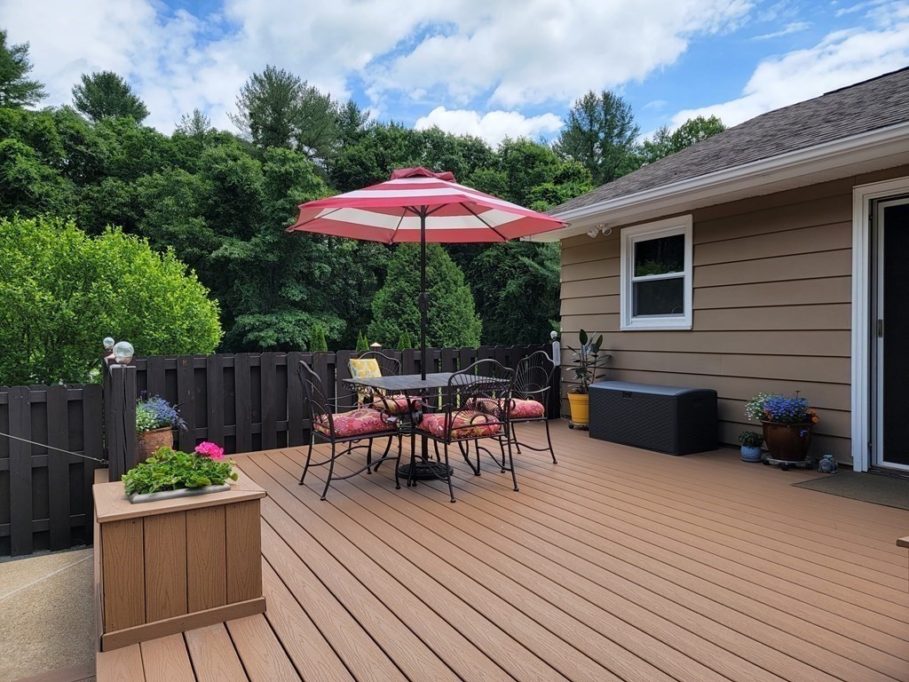 282 Old Gilbertville Road Ware, MA 01082 - Photo 23 of 31 a view of house with wooden deck and furniture