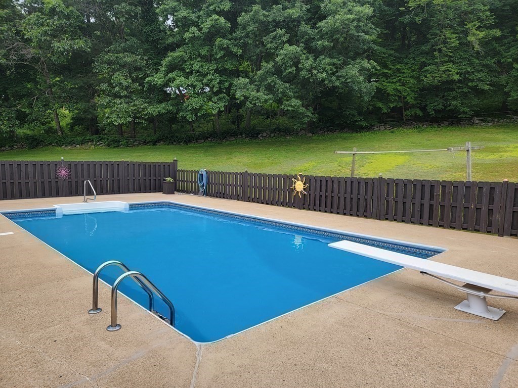 282 Old Gilbertville Road Ware, MA 01082 - Photo 26 of 31 a view of a swimming pool with a lounge chairs