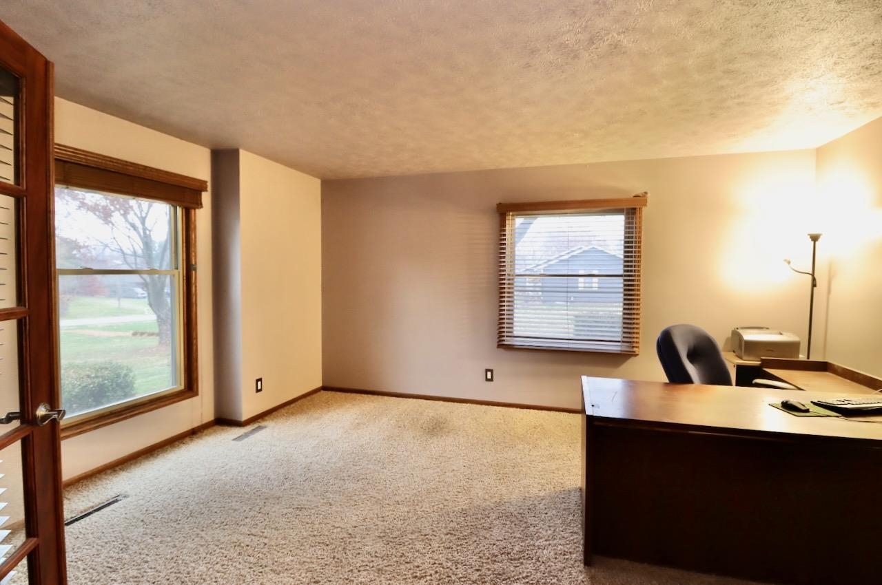 543 Fieldcrest Road Belvidere, IL 61008 - Photo 14 of 24 a view of room with window and bathroom