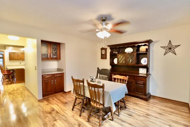a view of a dining room with furniture
