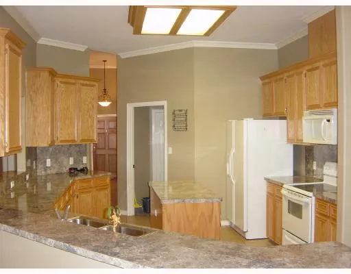 a bathroom with a tub mirror and sink
