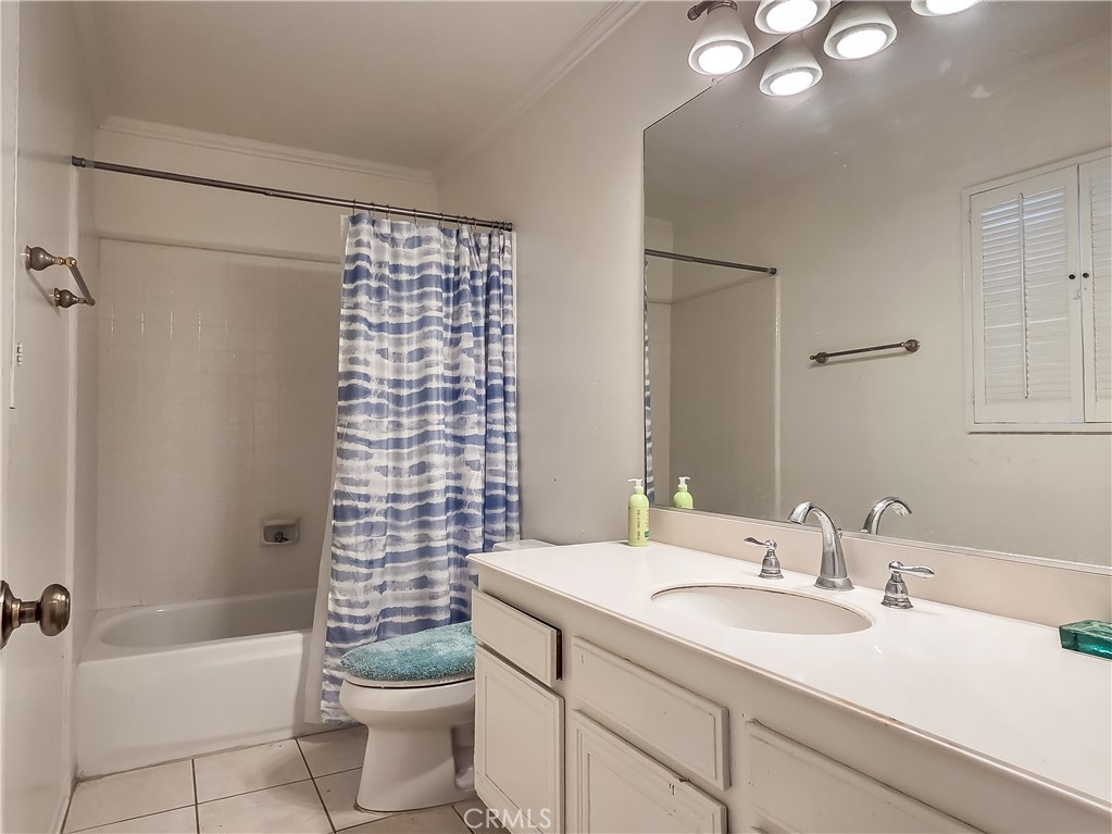 59 Rainbow Ridge Irvine, CA 92603 - Photo 12 of 35 a bathroom with a sink a toilet and shower