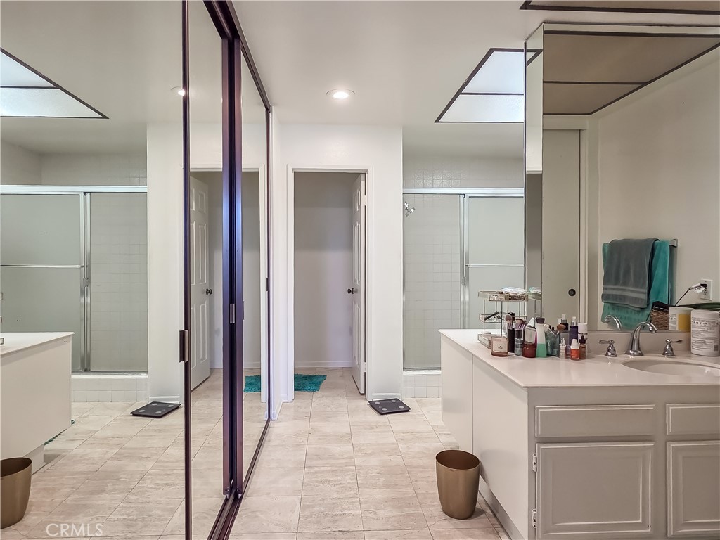 59 Rainbow Ridge Irvine, CA 92603 - Photo 15 of 35 a bathroom with a sink and a mirror