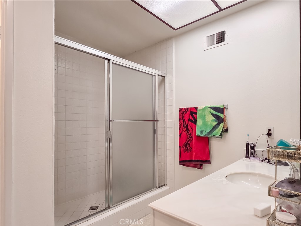 59 Rainbow Ridge Irvine, CA 92603 - Photo 17 of 35 a utility room with shower and mirror