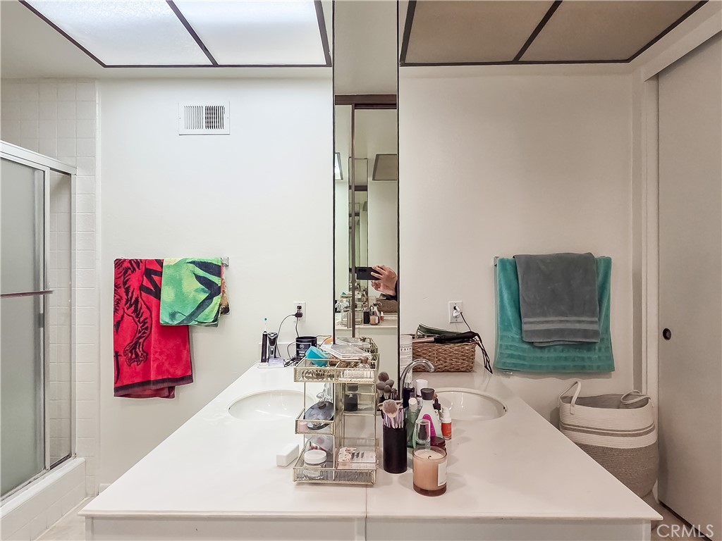 59 Rainbow Ridge Irvine, CA 92603 - Photo 18 of 35 a bathroom with a sink and a mirror