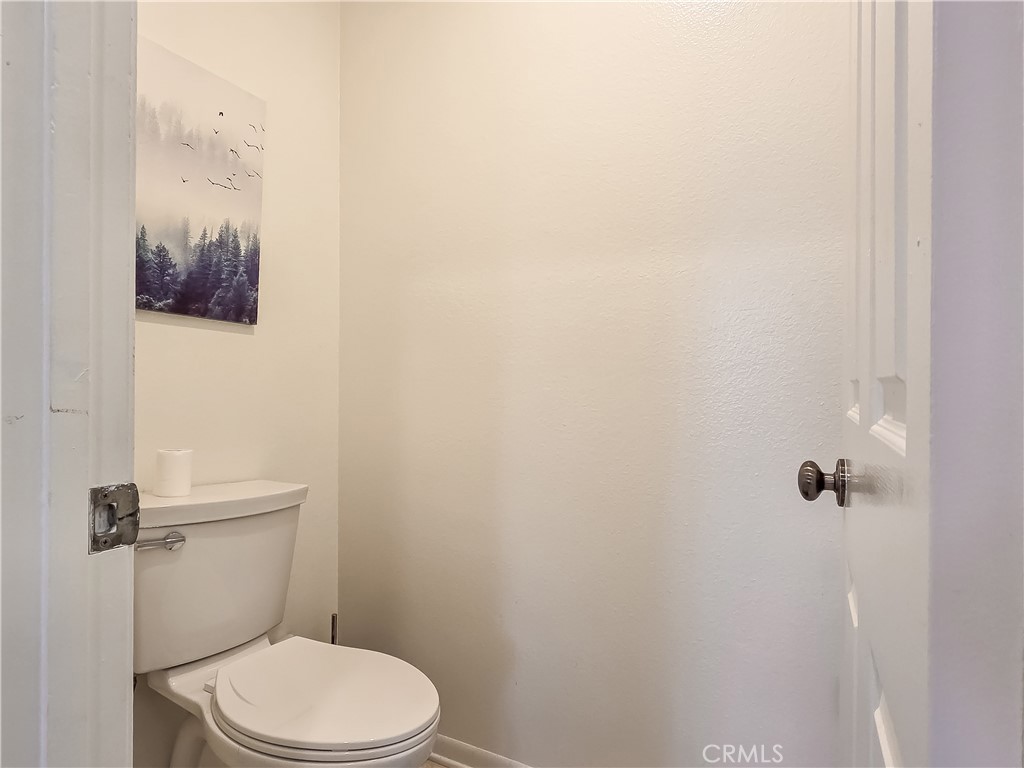 59 Rainbow Ridge Irvine, CA 92603 - Photo 19 of 35 a white toilet sitting next to a shower