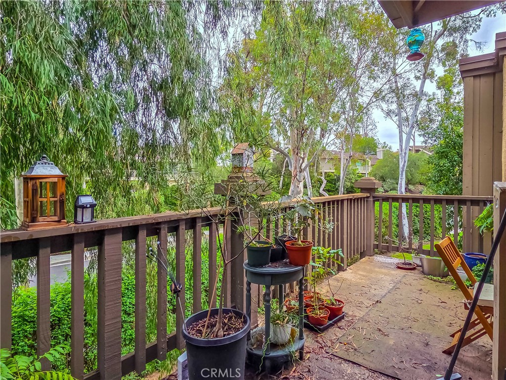 59 Rainbow Ridge Irvine, CA 92603 - Photo 23 of 35 a view of a balcony with wooden floor and outdoor seating