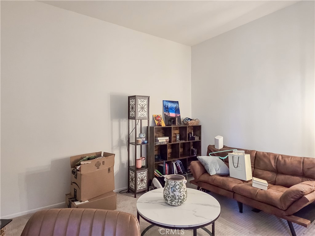 59 Rainbow Ridge Irvine, CA 92603 - Photo 10 of 35 a living room with furniture and a wooden floor