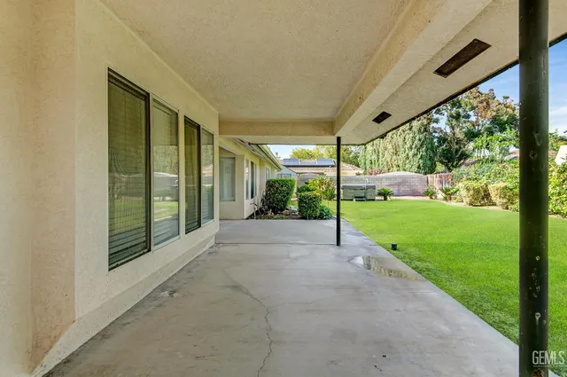 a view of a house with a big yard