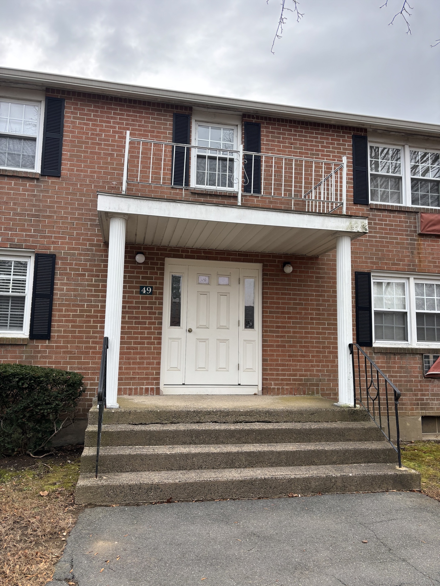 49 Grandview Drive, Unit A Farmington, CT 06032 - Photo 1 of 18 a front view of a house